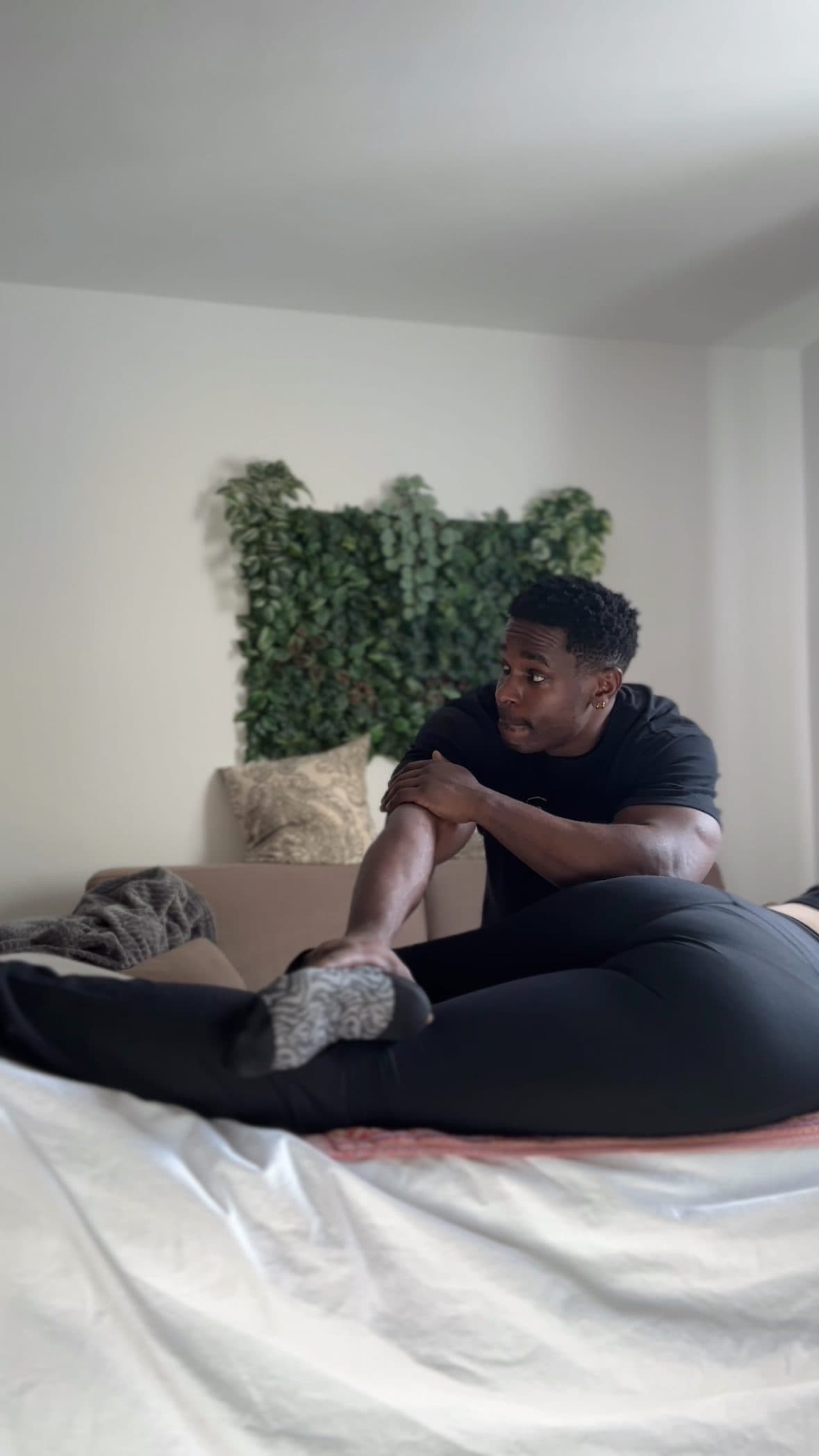 Eddie performing a hip and piriformis release